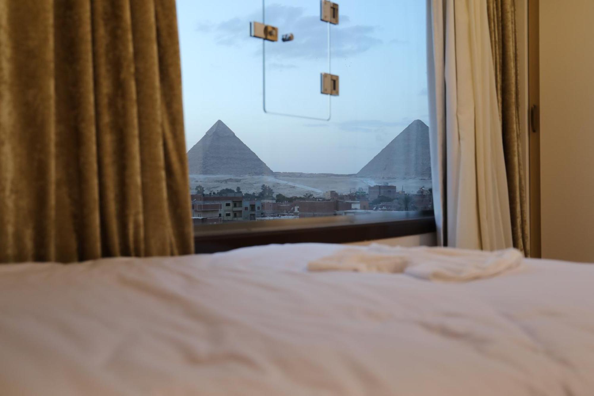 Pyramids Heart Hotel Kafret el-Gabal Esterno foto