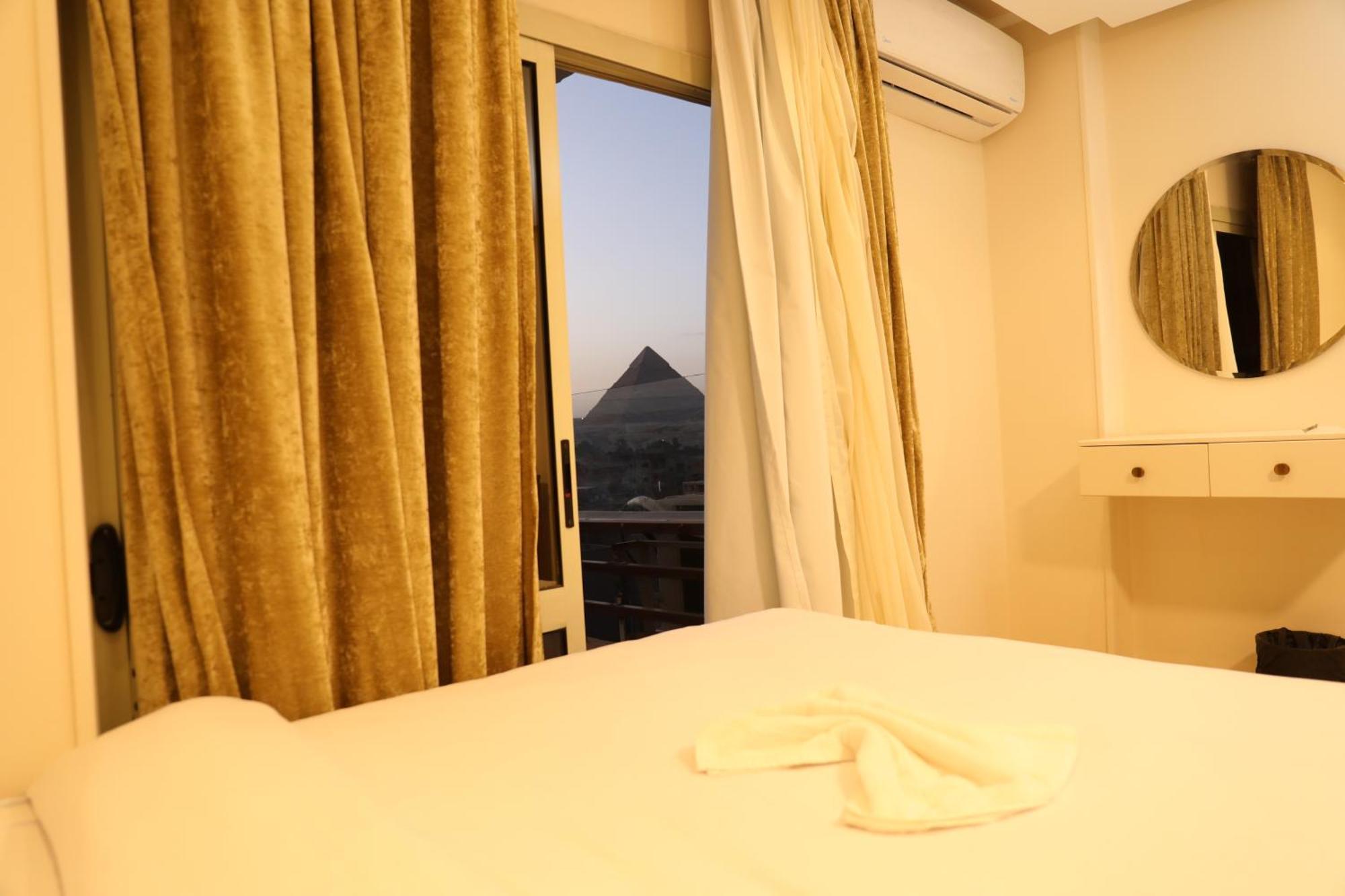 Pyramids Heart Hotel Kafret el-Gabal Esterno foto