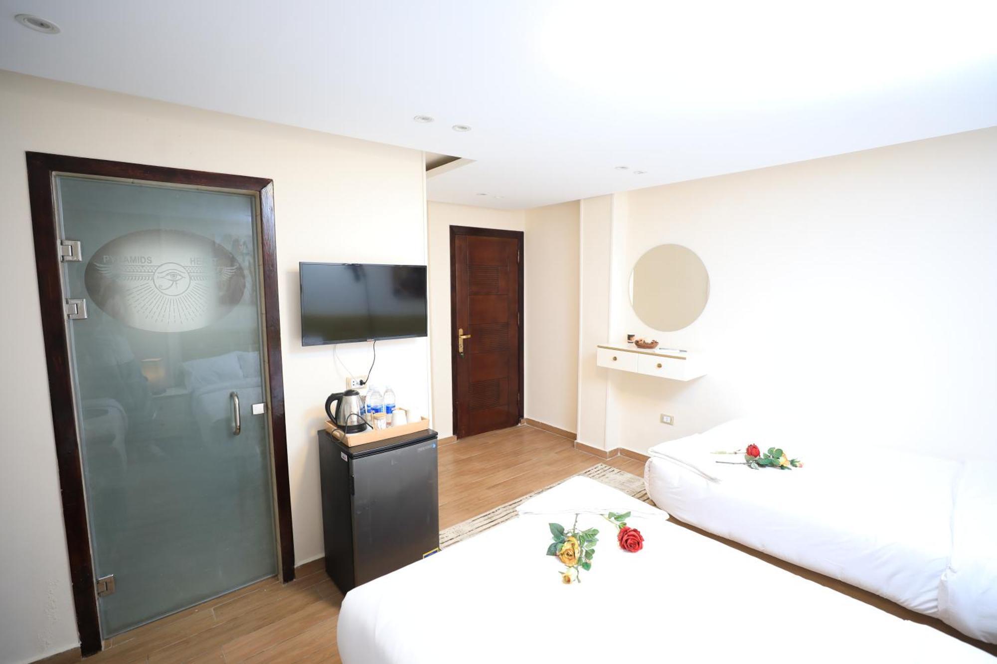 Pyramids Heart Hotel Kafret el-Gabal Esterno foto